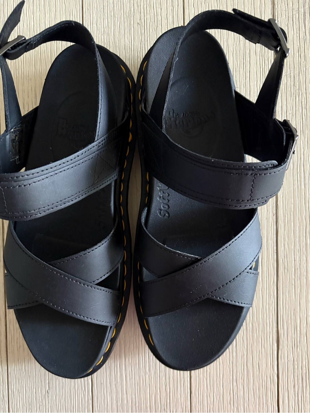 Dr. Martens Black Leather Cross-Strap Woman Sandals with Yellow Stitching